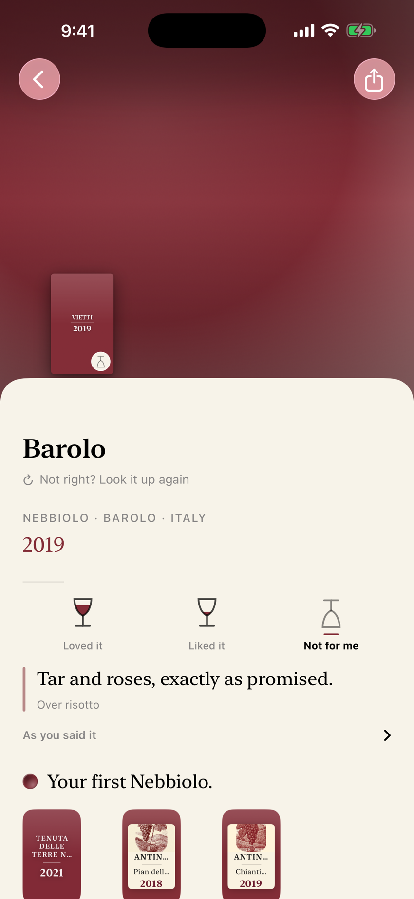 One bottle in Punt: its plate resting on the wine's own colour, the grapes and region, the three glasses, and the note you wrote about the night